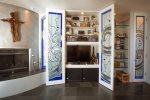 Entertainment Center Hidden Behind Beautiful Stained Glass Art Doors in the Living Room